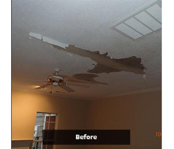 living area ceiling damaged by water 